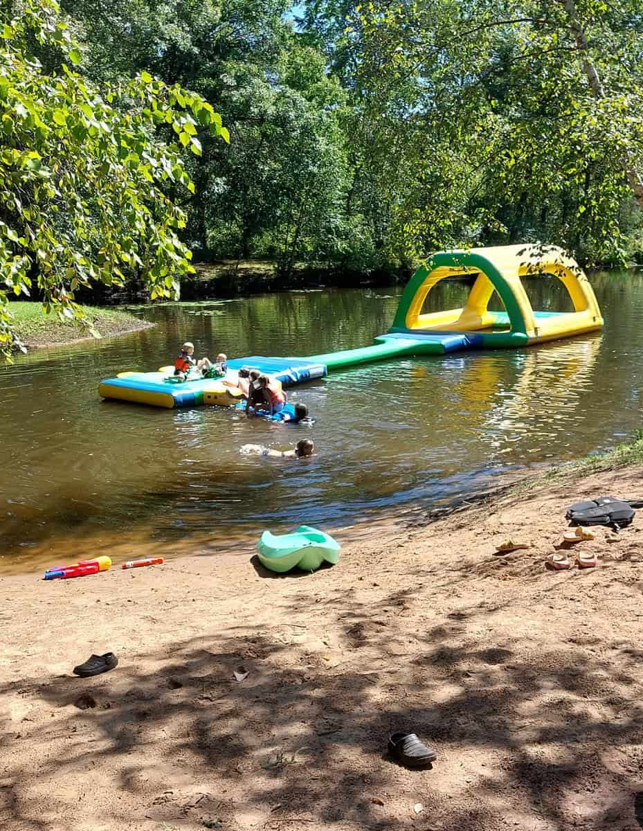 Kids Play In The Spring Fed Pond At Winding River Campground